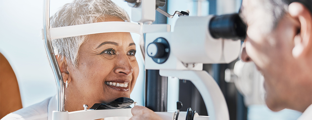 Image of woman getting her eyes examined by an eye care professional